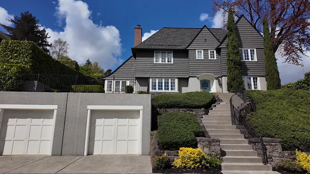 Classic historic-style home exterior with landscaped entry and walkway in northwest Portland