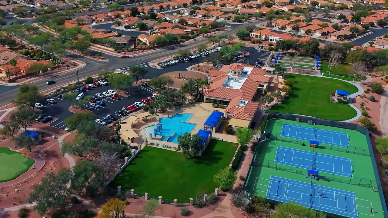 Aerial view of Continental Ranch recreation center with pool and tennis courts