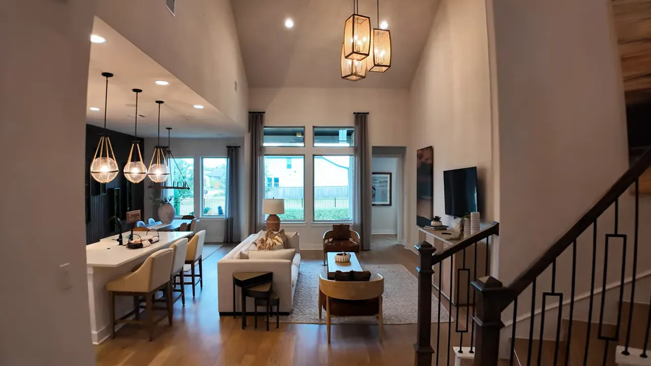 Bright open-concept living room and kitchen area in a modern home