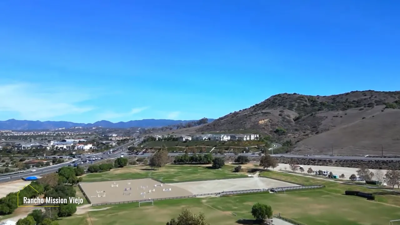 Wide aerial view of Rancho Mission Viejo hills parks and surrounding roads