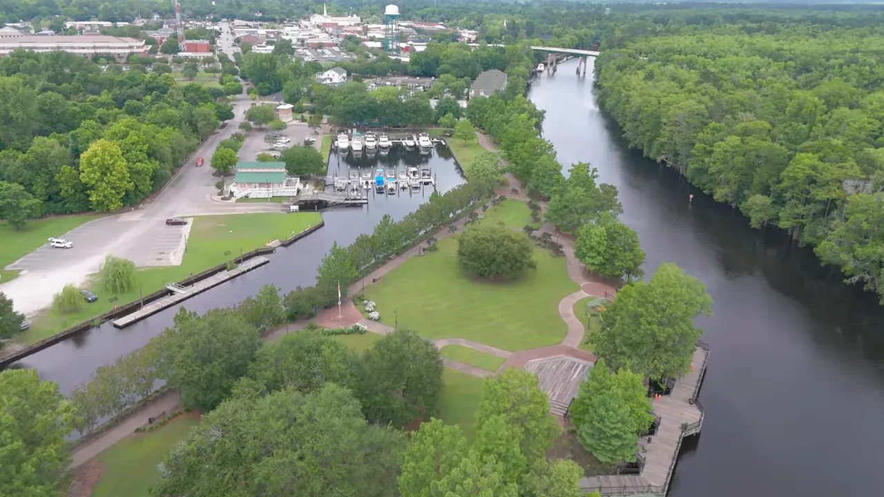 Drone view of Conway Riverwalk, marina, park and downtown in the distance