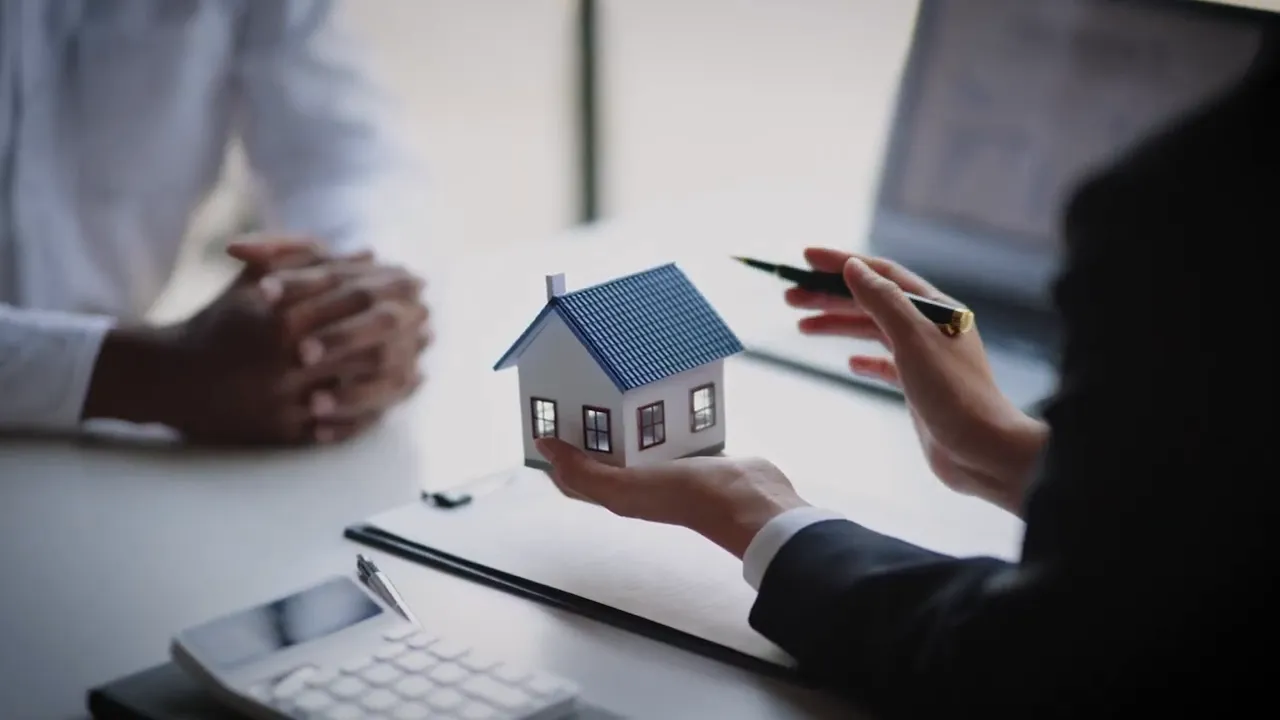 Illustration of hands holding a house model during a discussion about real estate negotiation