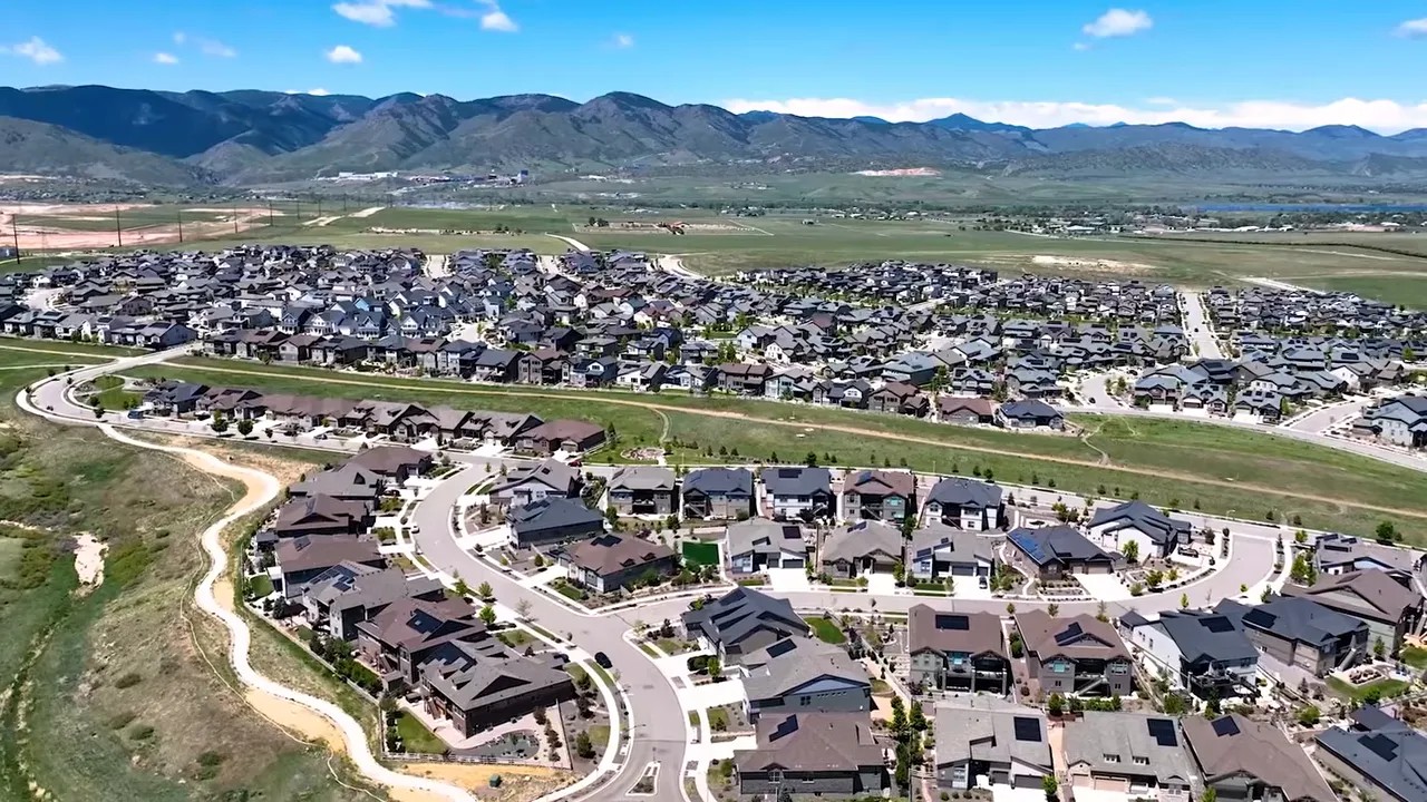 Aerial view of a Denver-area new construction community neighborhood with many homes