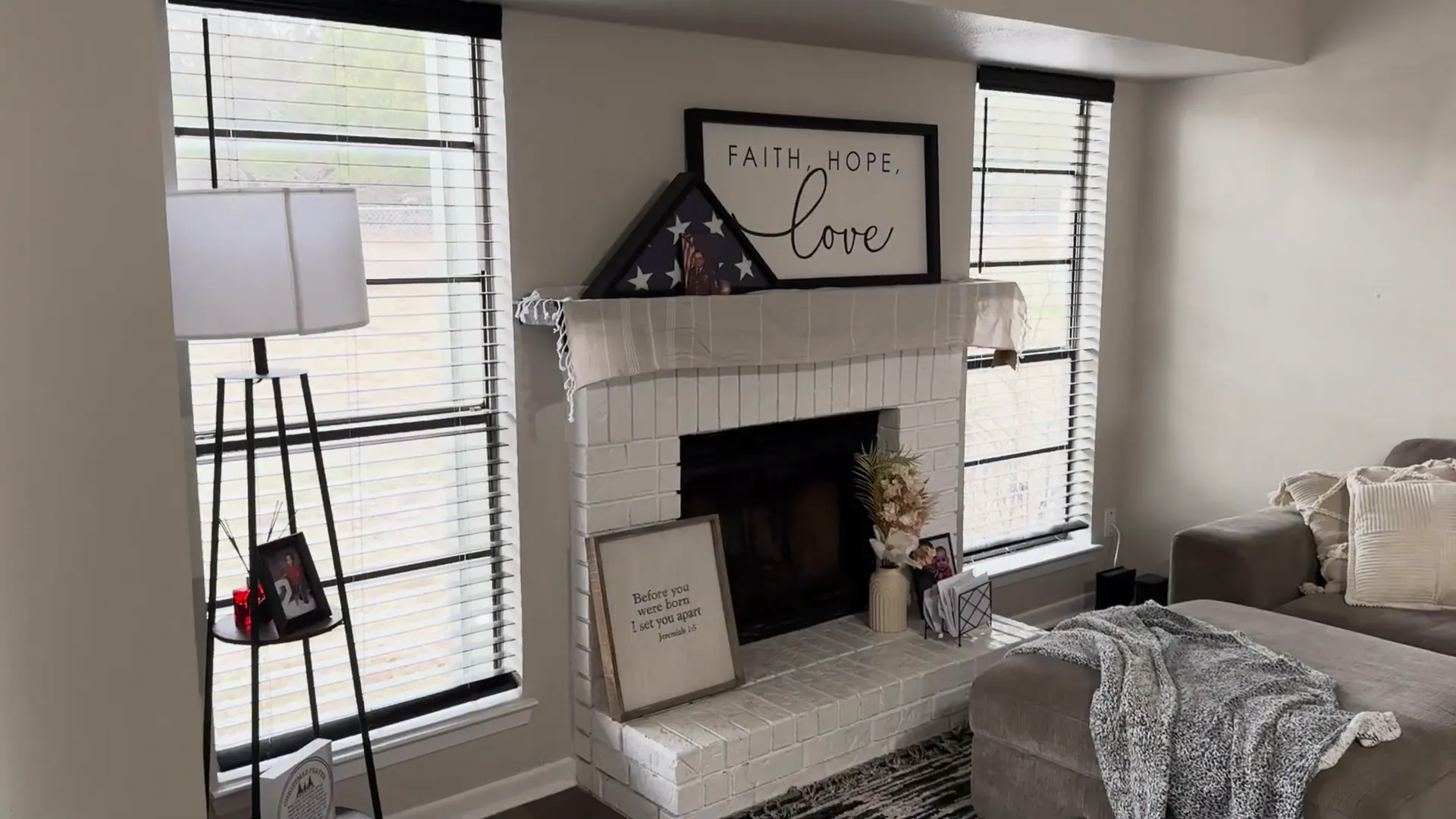 Living room with vinyl plank flooring and fireplace