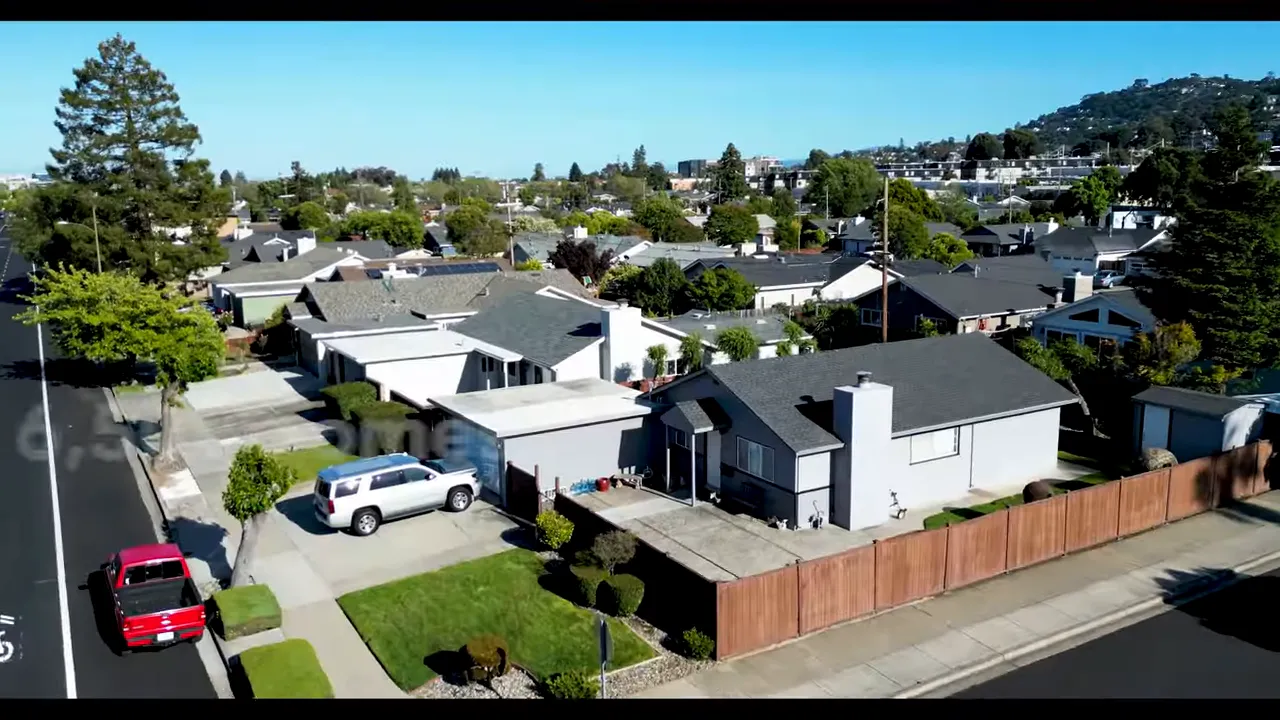aerial neighborhood view with on screen text reading 6500 homes