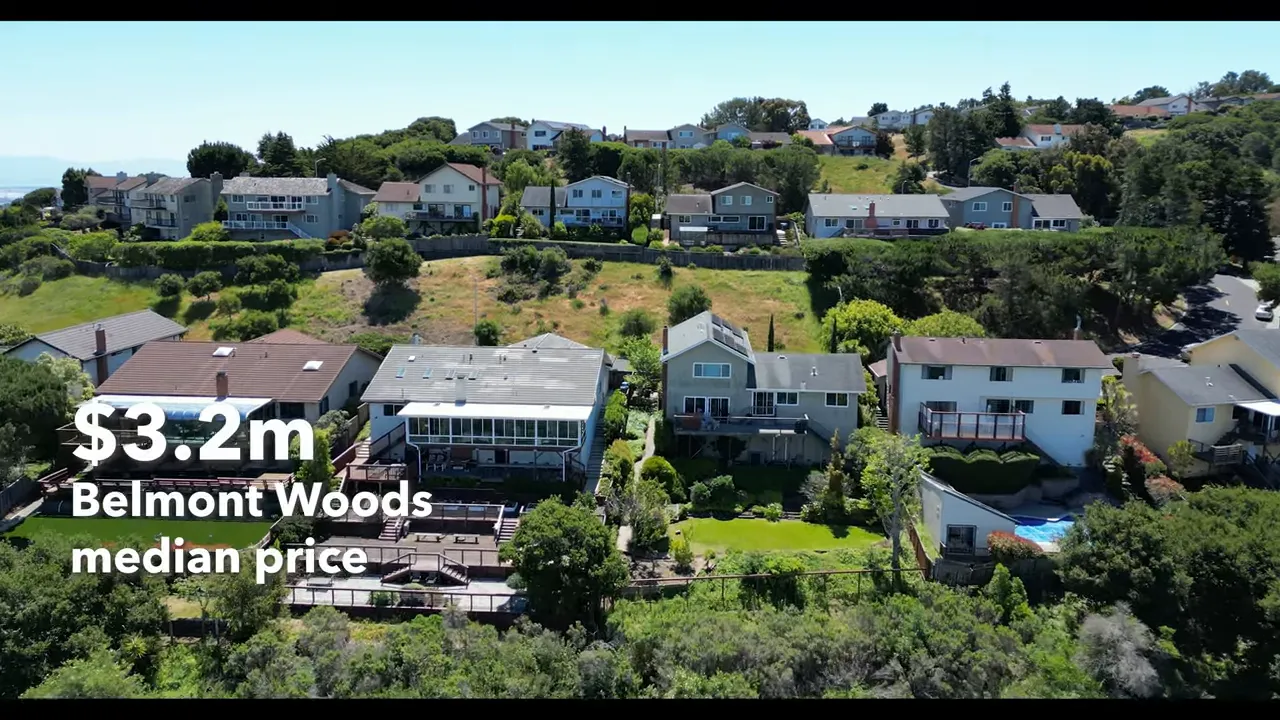 hillside homes with on screen text reading 3.2m Belmont Woods median price