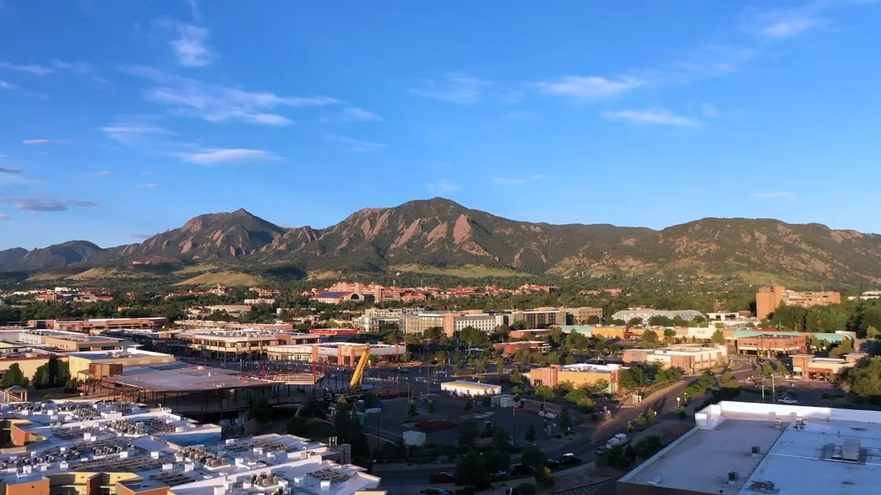 Aerial view of Longmont Colorado with mountains in the background