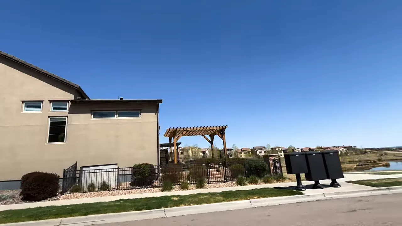 Patio-style home exterior with outdoor seating area in a Denver-area community