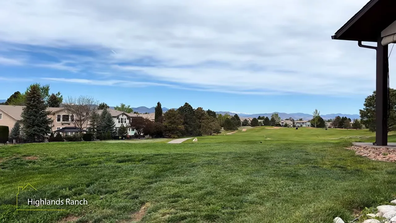 Wide view of a golf course fairway in the Highlands Ranch Golf Club community