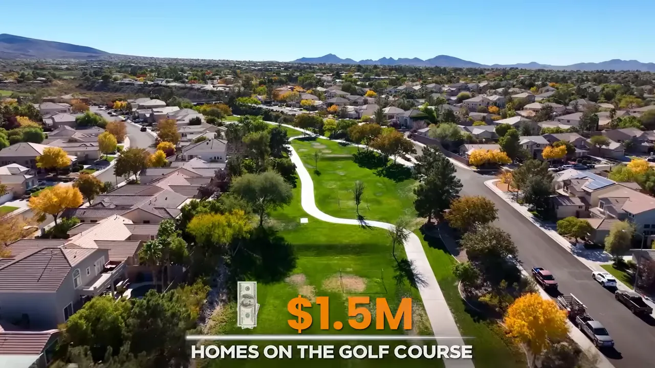 Green golf course fairway between Sun City Anthem homes