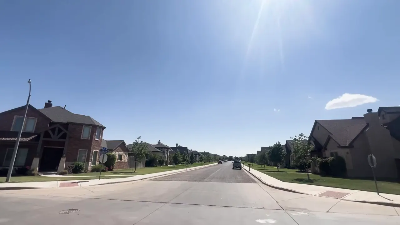 Large estate-style homes around the pond