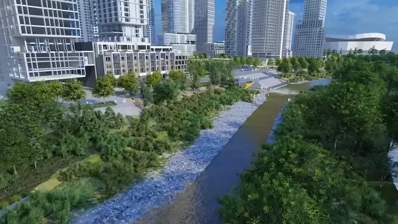 Aerial-style render of a South Platte River corridor with green landscaping and modern buildings