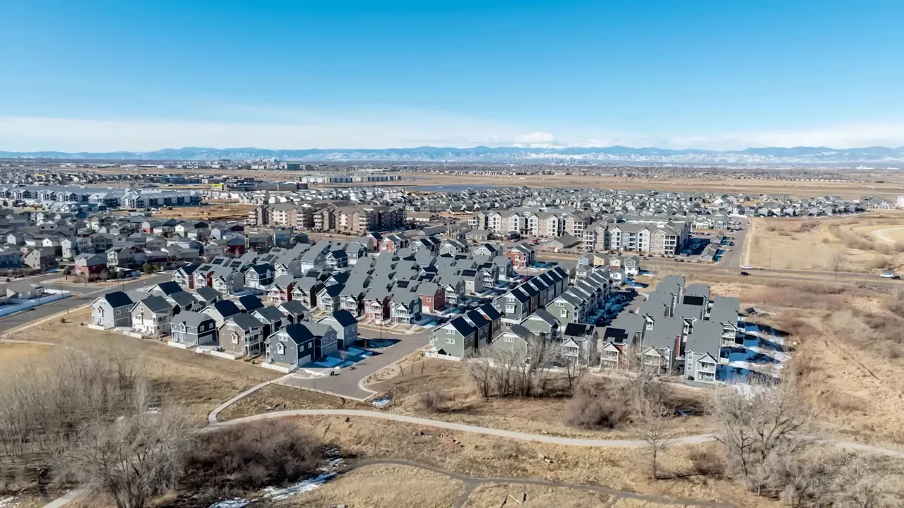 Aerial view of Denver suburban neighborhoods with surrounding plains