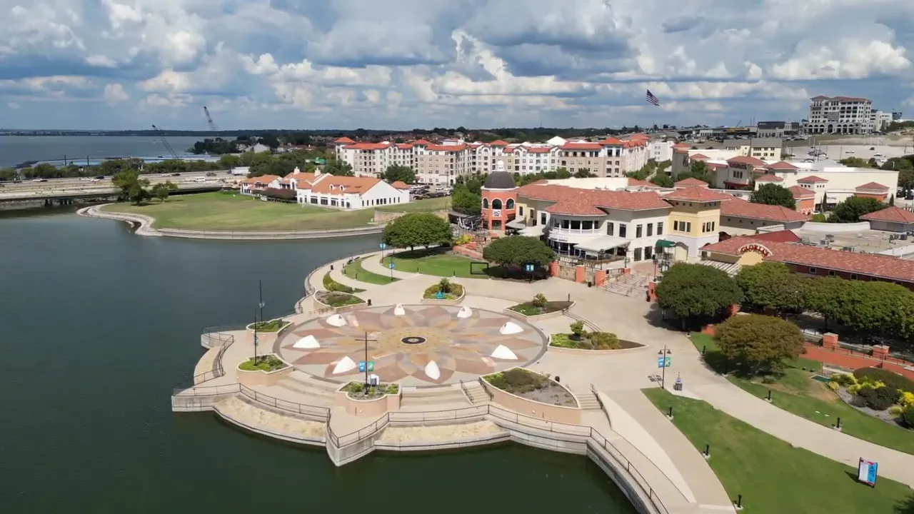 Aerial view of Rockwall waterfront promenade and marina on Lake Ray Hubbard