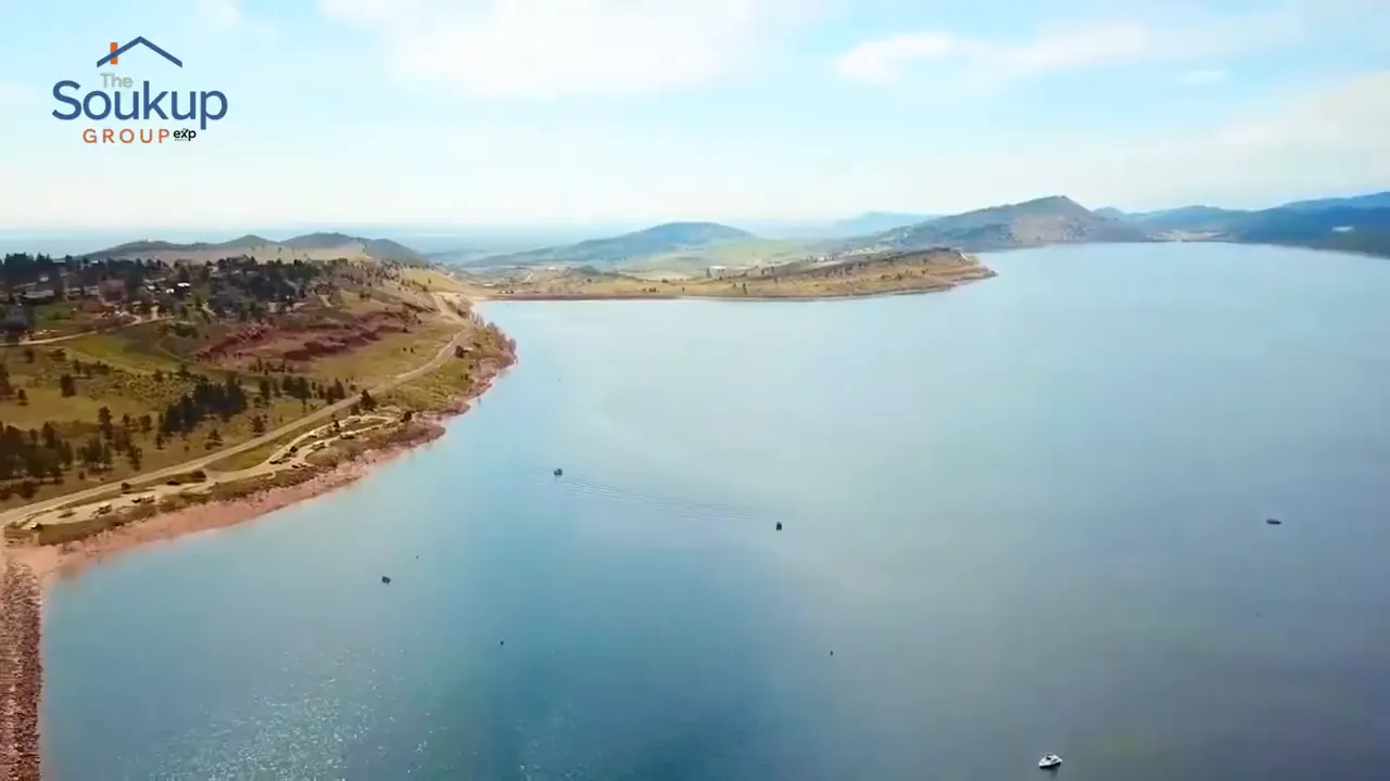 Aerial view of Carter Lake shoreline and surrounding foothills