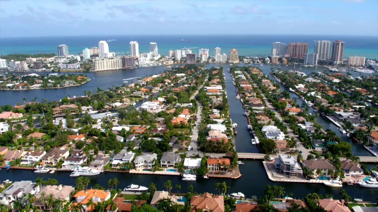 Aerial view of Hidden Valley in East Boca Raton with canal homes and waterways