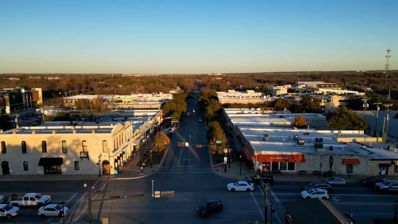 Aerial view of Round Rock Texas retail and restaurants along a main road