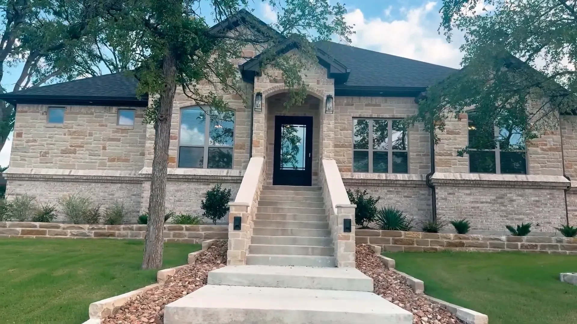 Front exterior of Carothers Reagan floor plan home at Wildflower Country Club