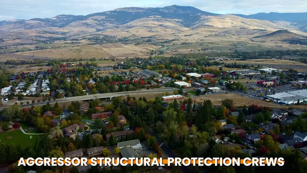 Aerial neighborhood view with labels for defensible space and regional firefighting response