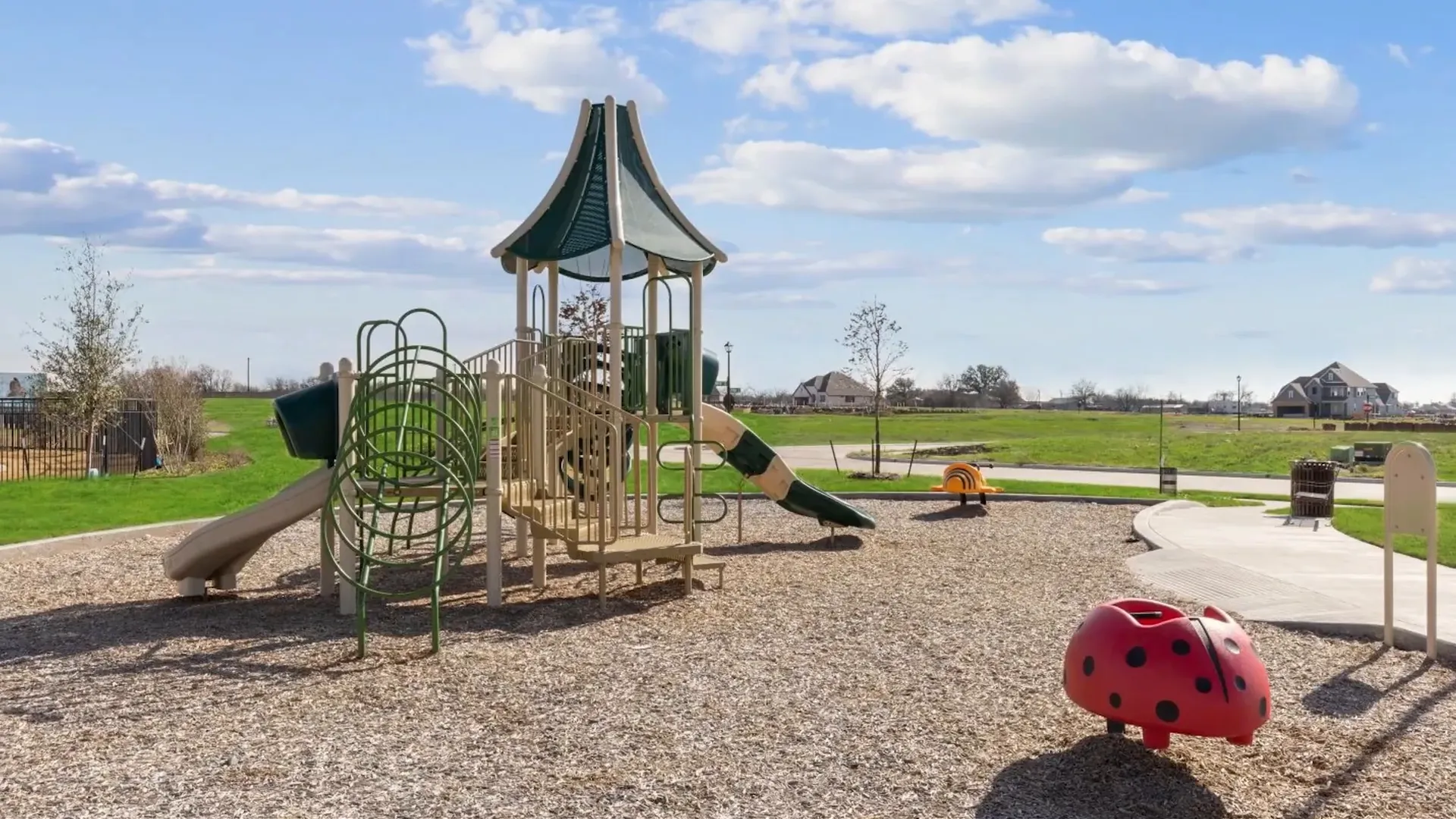 Community swimming pool and playground at De Berry Reserve