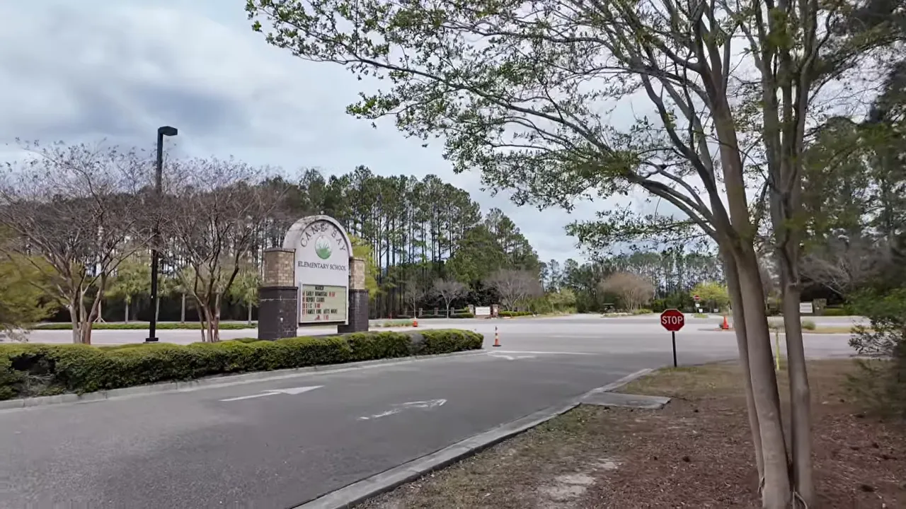 Road and entrance sign at Cane Bay Elementary School in Cane Bay Plantation, Summerville SC