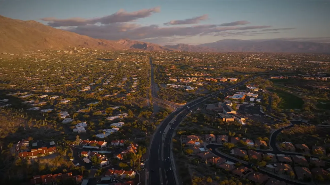 Aerial sunset view over Catalina Foothills homes and the Tucson Valley