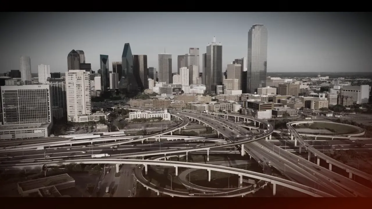 High-clarity aerial image of Dallas skyline with freeway interchanges in the foreground