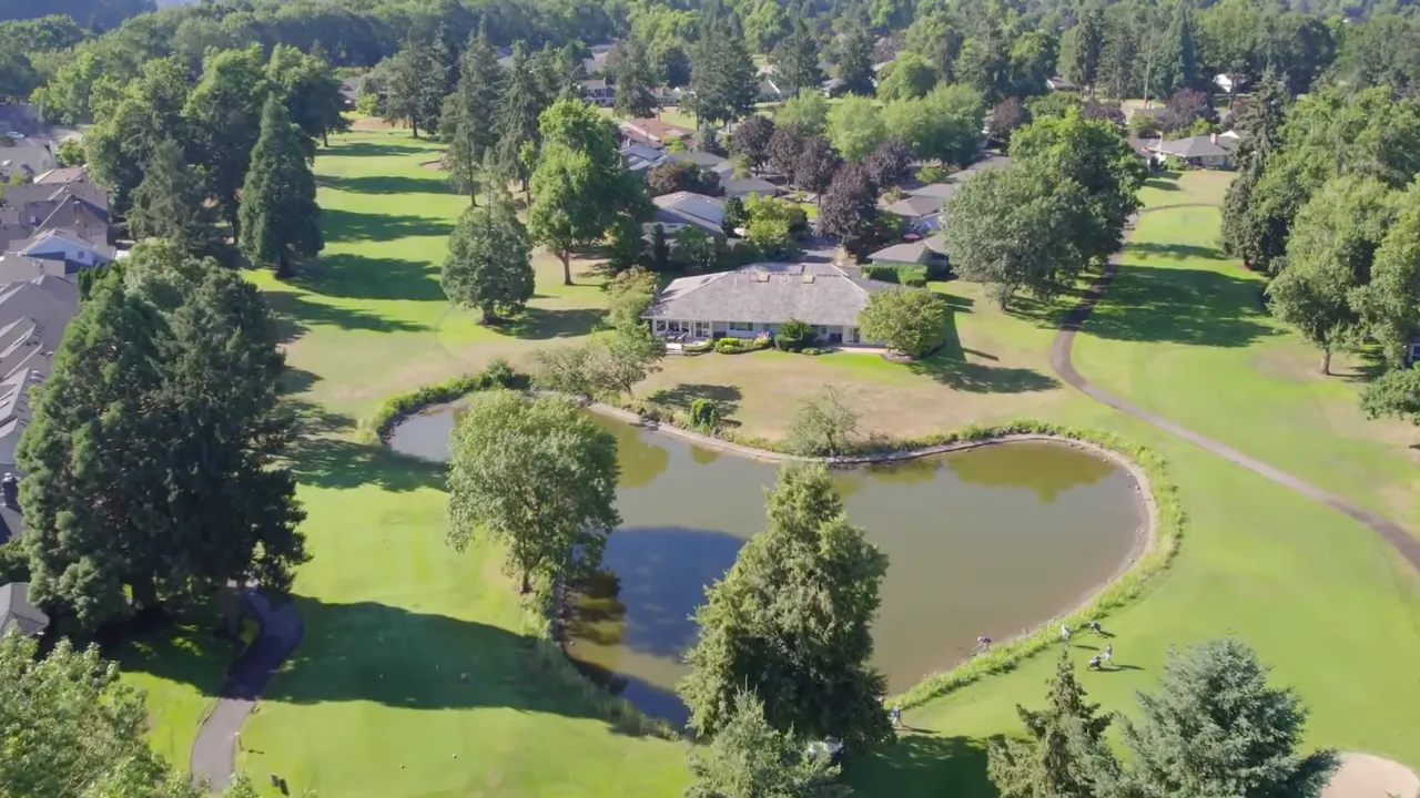 Aerial view of Charbonneau golf course fairways and trees