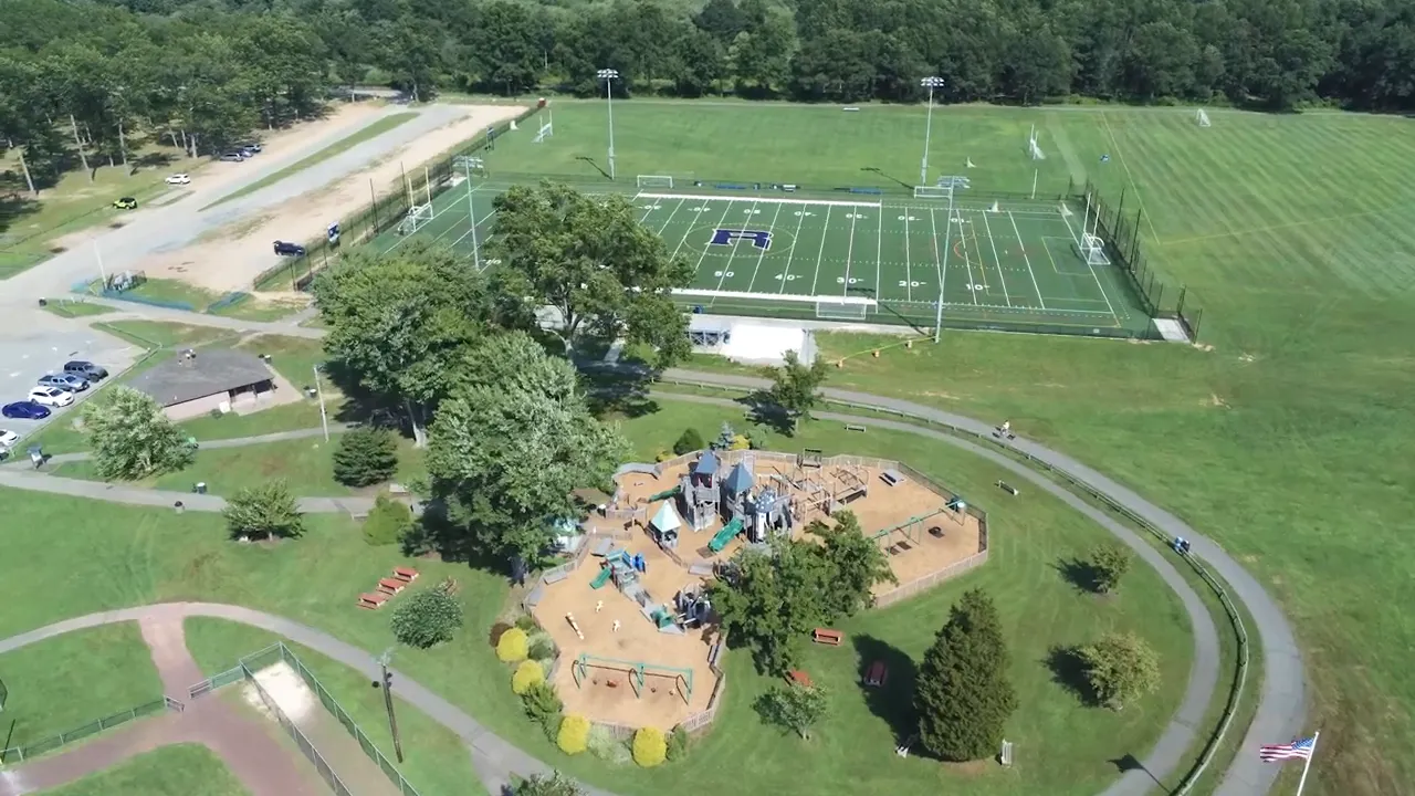 Wide aerial view of Horseshoe Lake recreation fields, playground area, and park grounds in Succasunna, Roxbury New Jersey