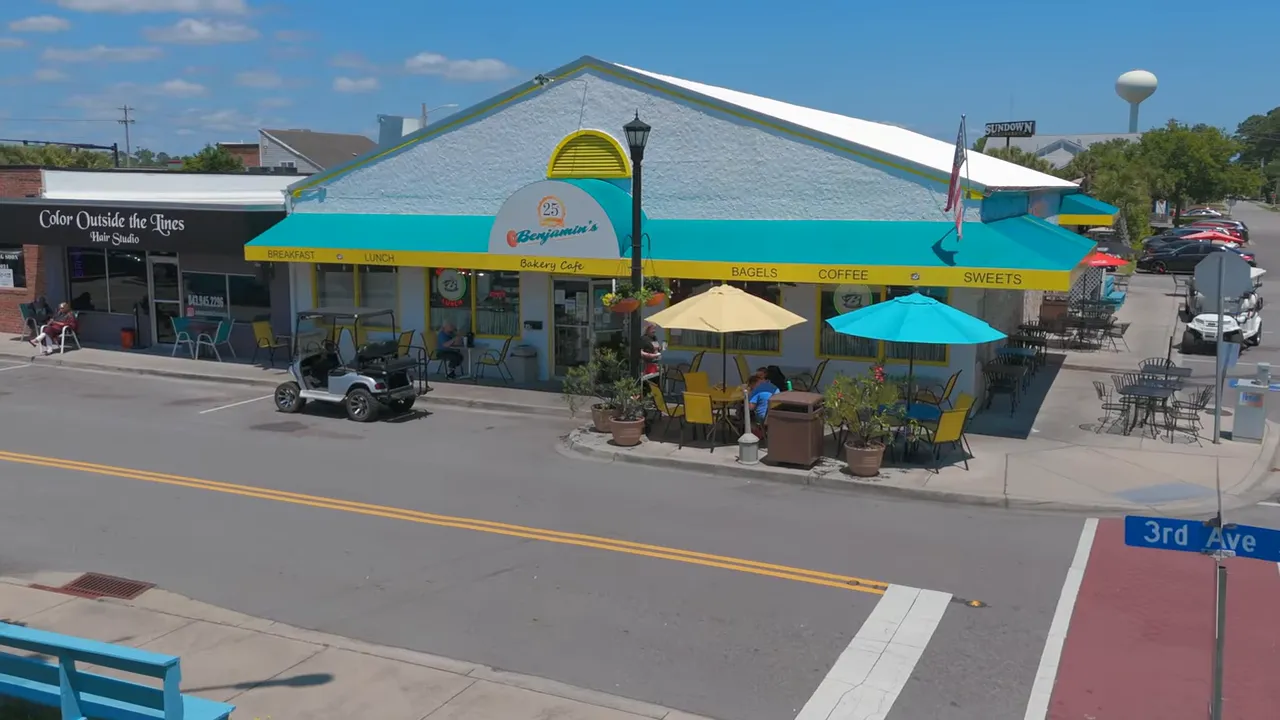 Surfside Beach South Carolina storefronts with outdoor seating and local businesses
