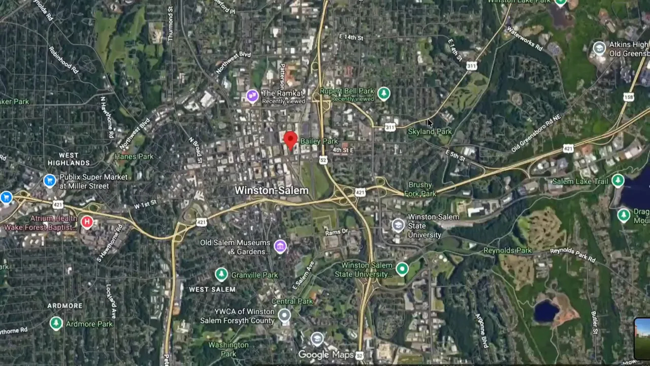 Satellite map of Winston-Salem with a red location marker
