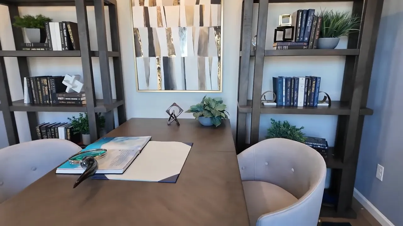 Desk and built-in bookshelves in flex home office room at Tri Pointe Aurora Highlands