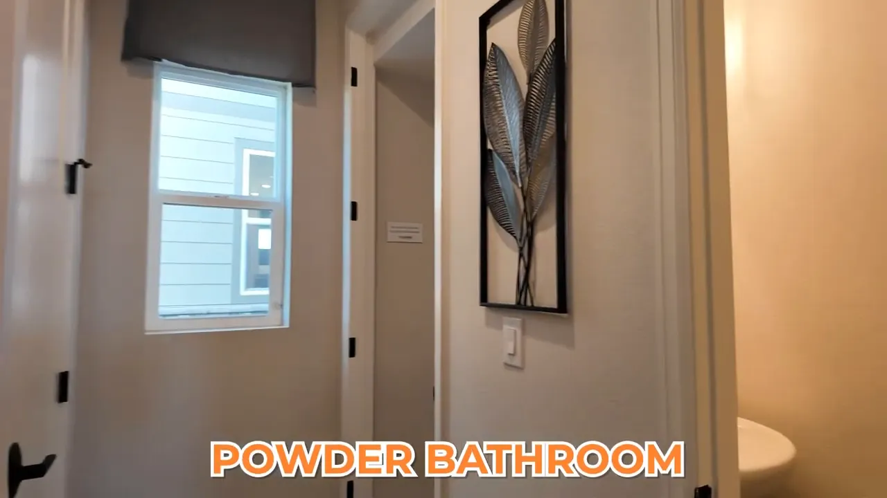 Powder bathroom in Tri Pointe Crescendo model home at Aurora Highlands
