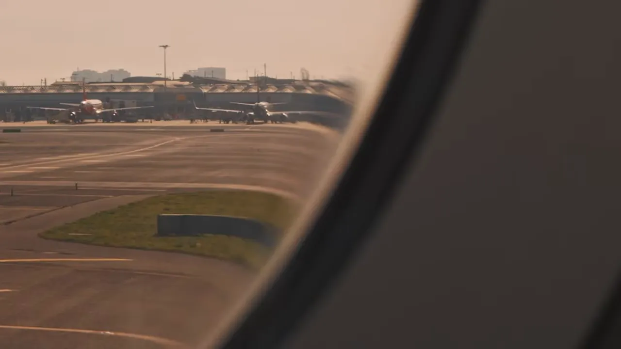 View from airplane window over runway with text reading cmh airport