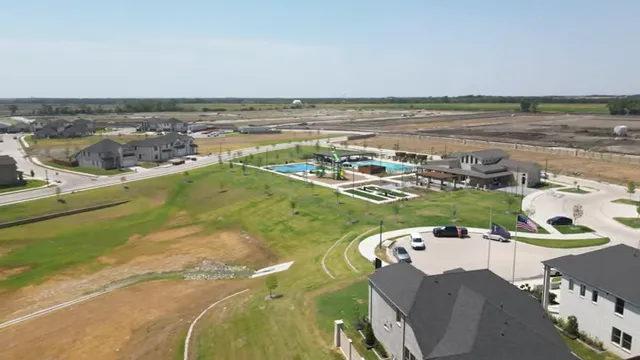 Aerial view of Eastridge homes, amenity center, open land, and developing roads