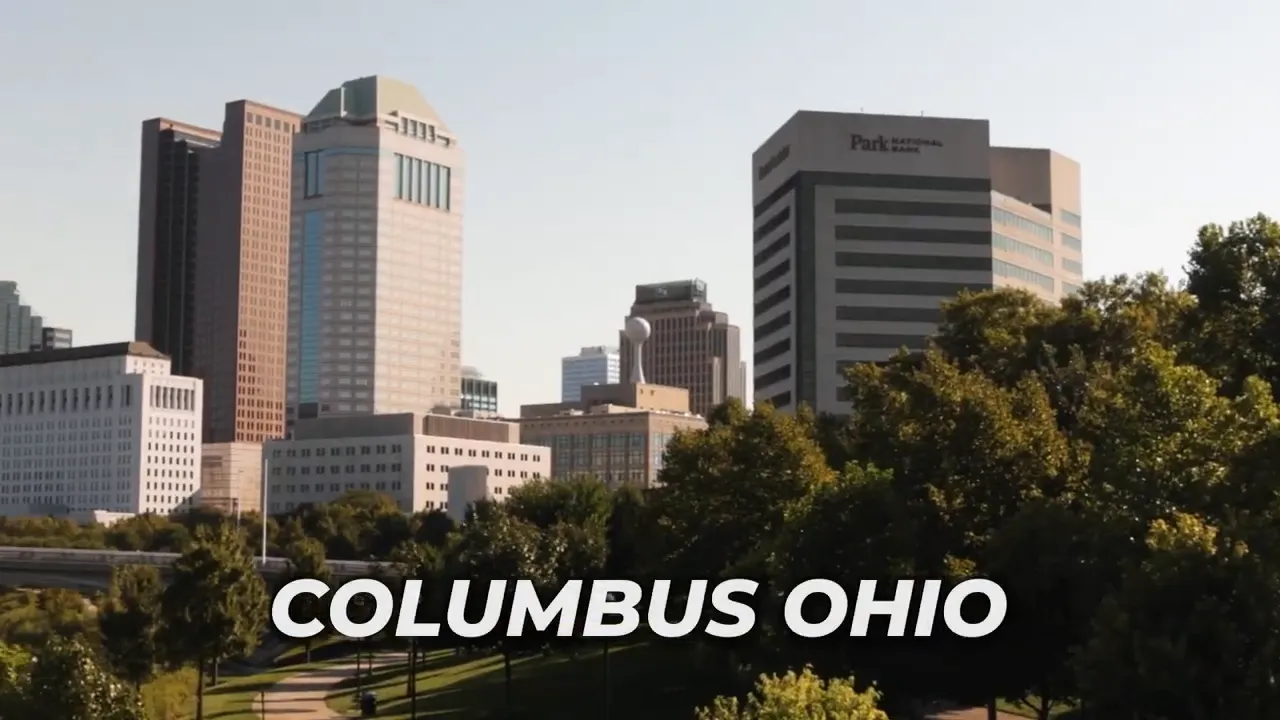 Downtown Columbus buildings with text reading Columbus Ohio