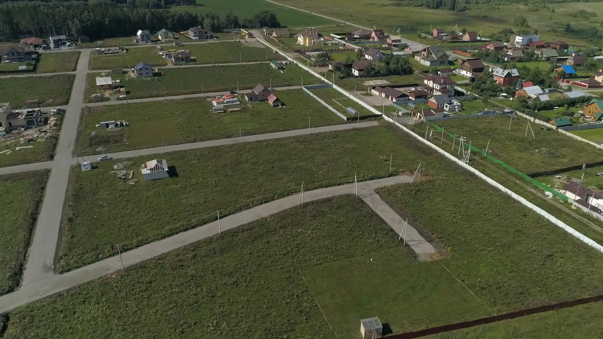 Aerial view of new roads and home sites in a developing community