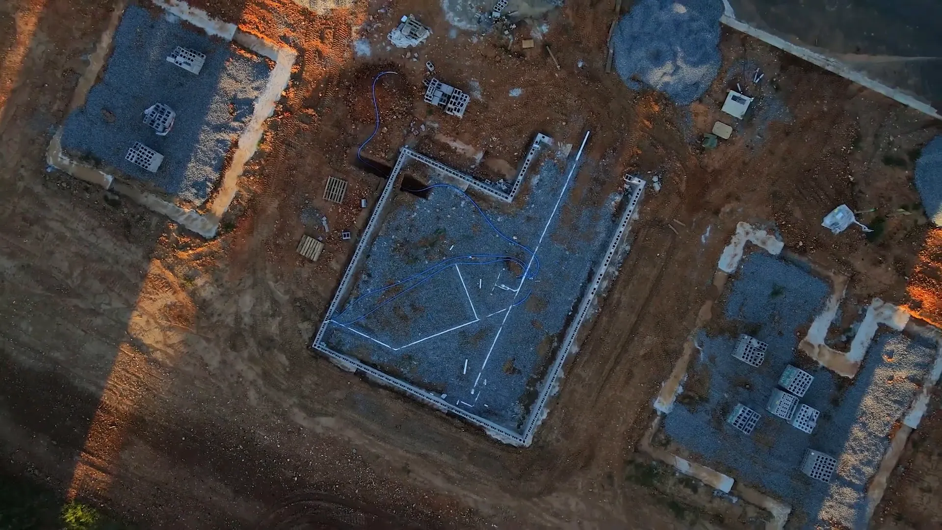 Aerial construction site with the numbers 40 50 and 60 displayed