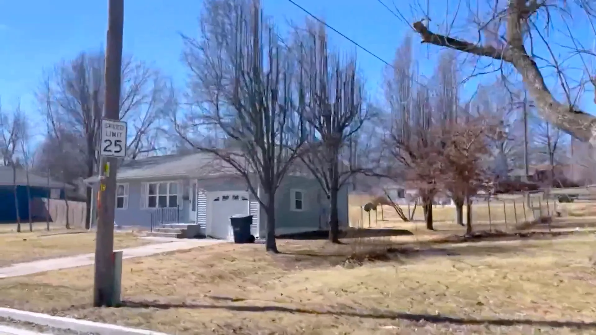 New subdivision home in Knob Noster with wooded yard
