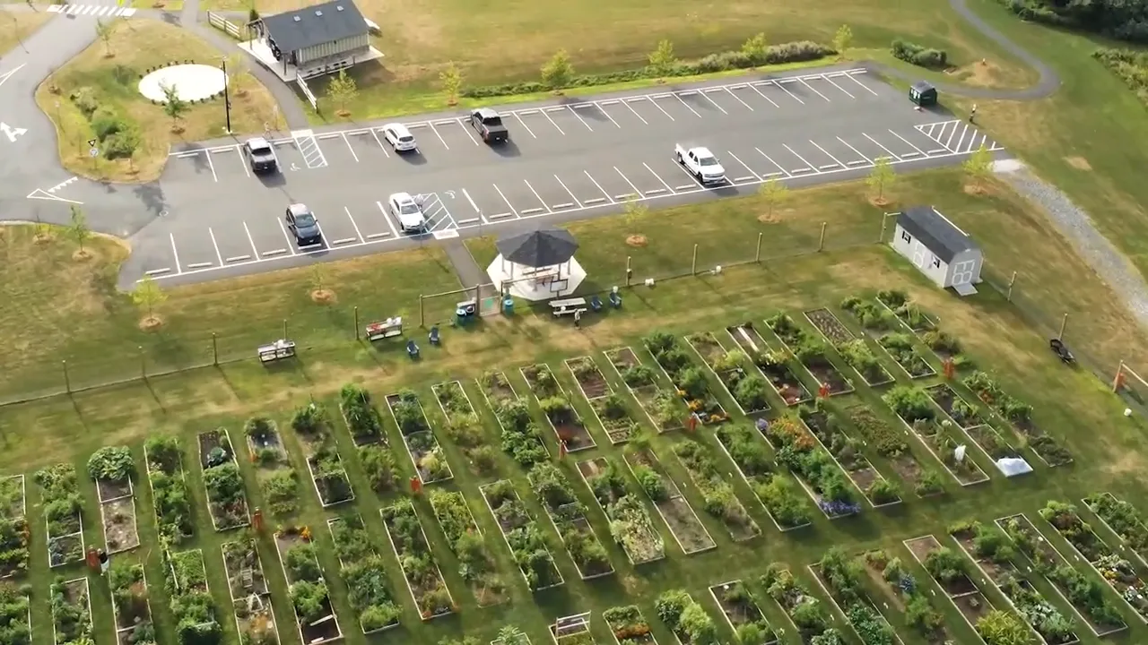 Clear aerial view of Randolph community garden with organized raised beds
