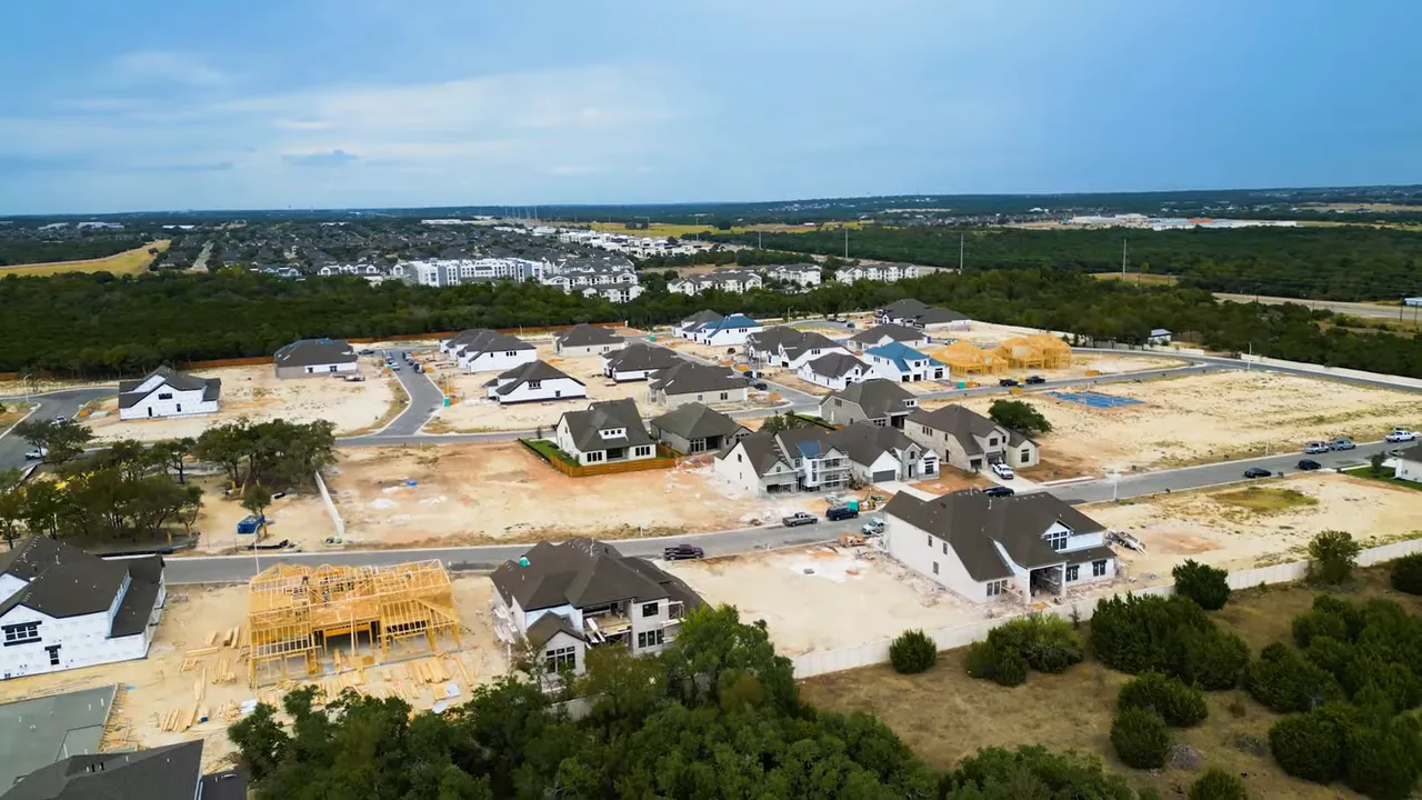 Aerial view of Palmera Ridge area in Leander TX showing new subdivisions and surrounding landscape