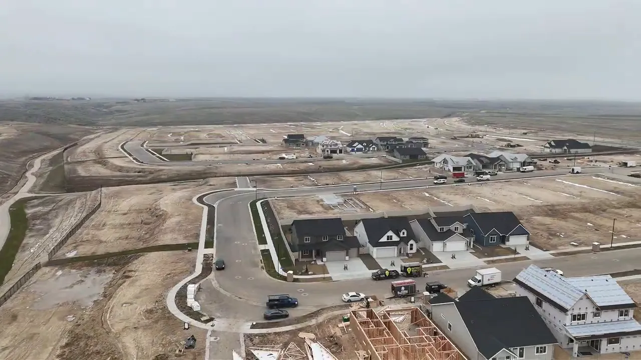 Aerial view of new home development in Idaho with winding roads