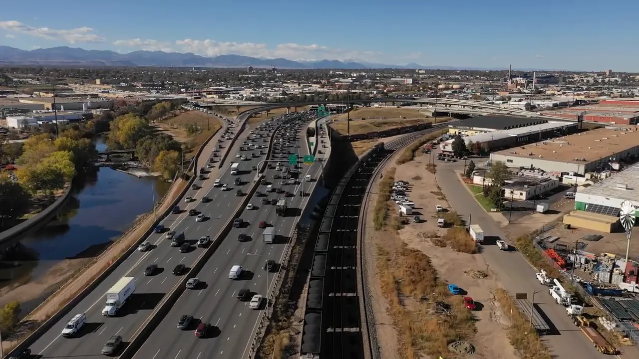 Aerial view of heavy traffic on a major freeway near Denver