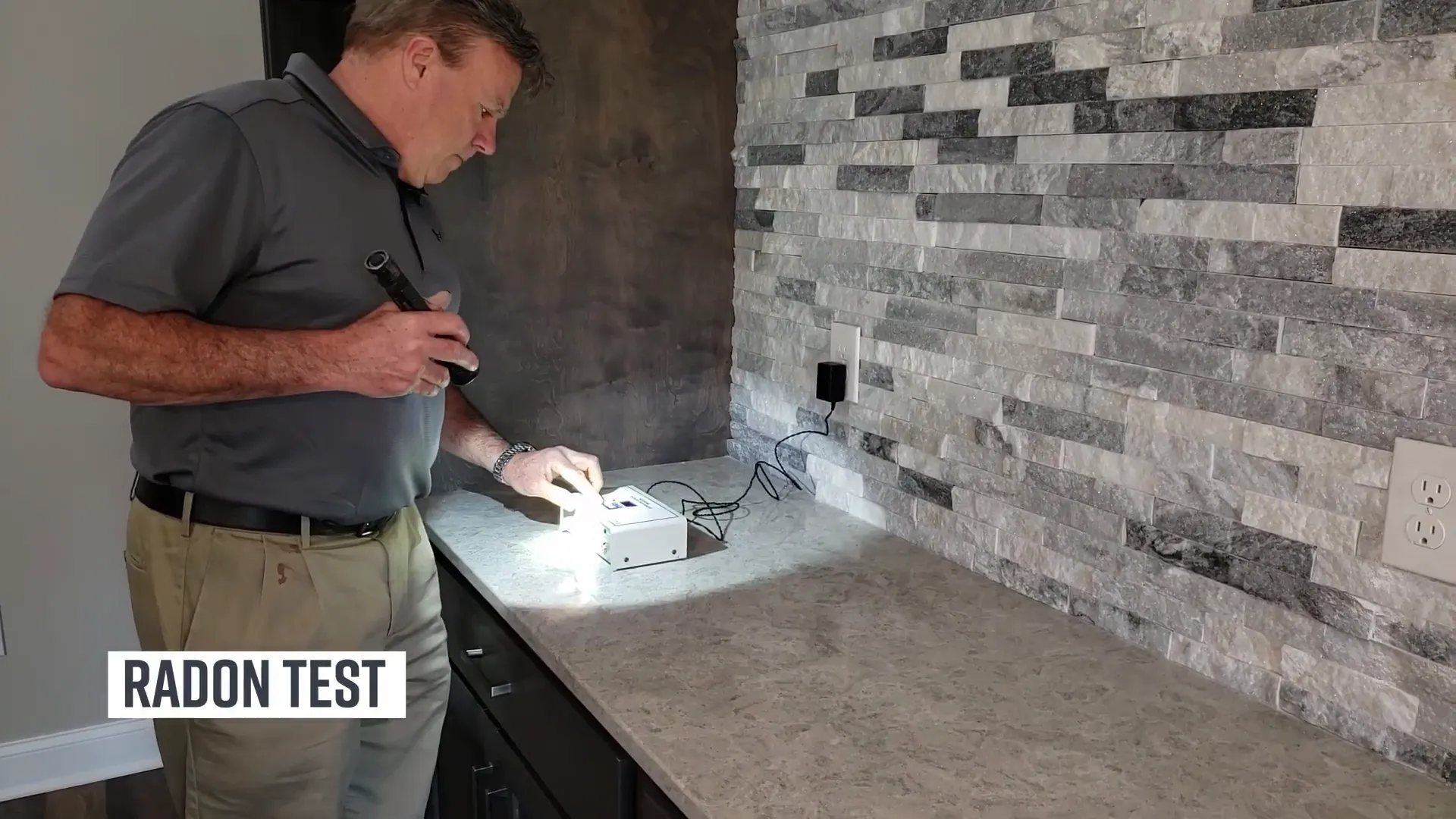 Radon test device in basement