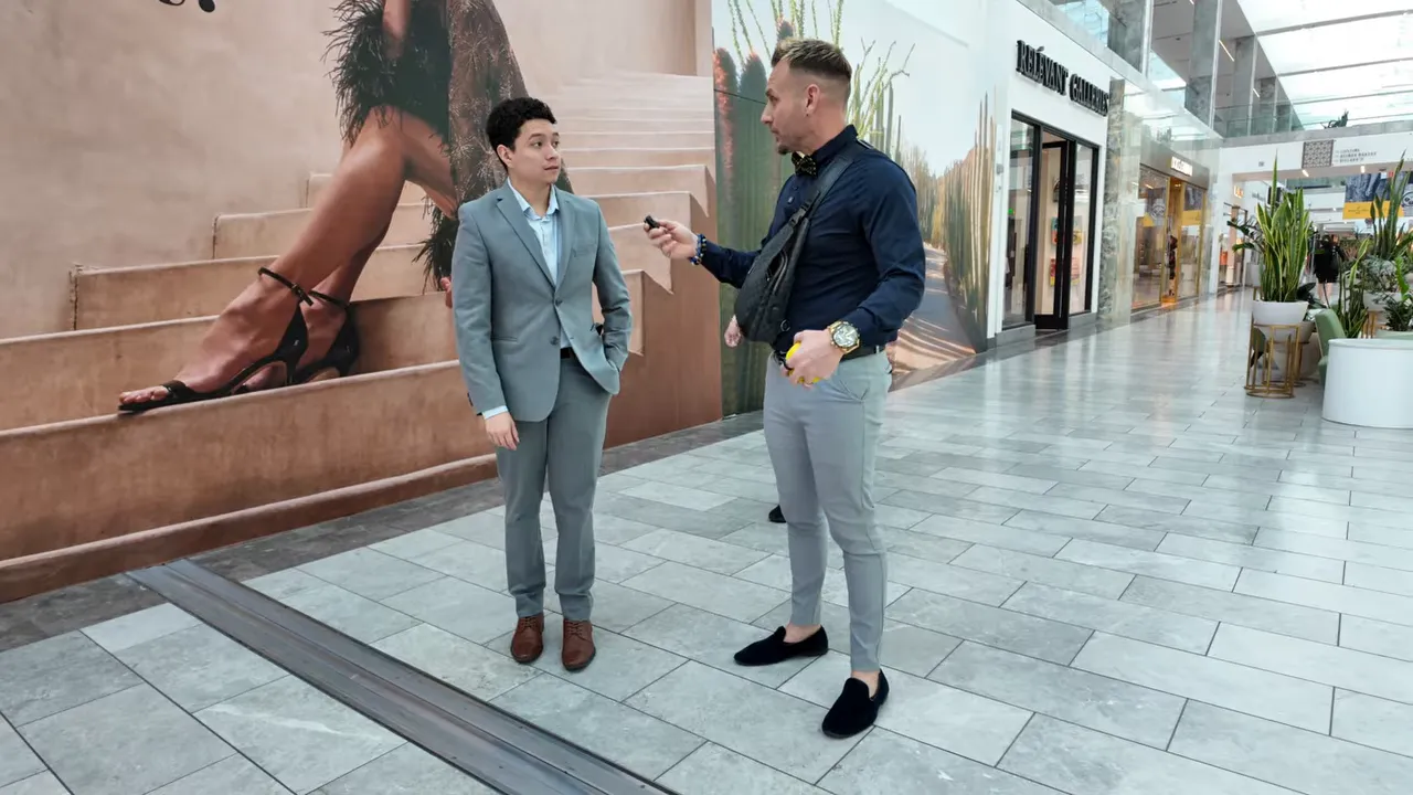 Real estate agent talking with a person during a street interview