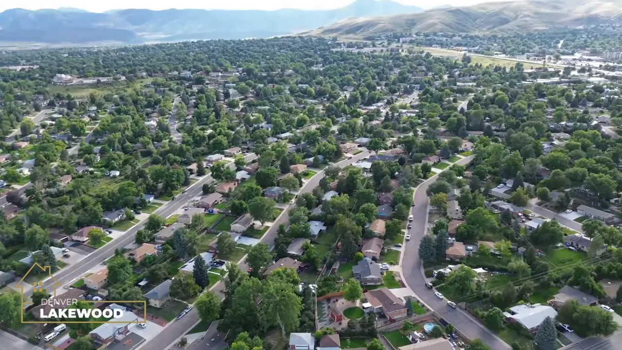 Aerial view of Lakewood neighborhoods with foothills in the distance