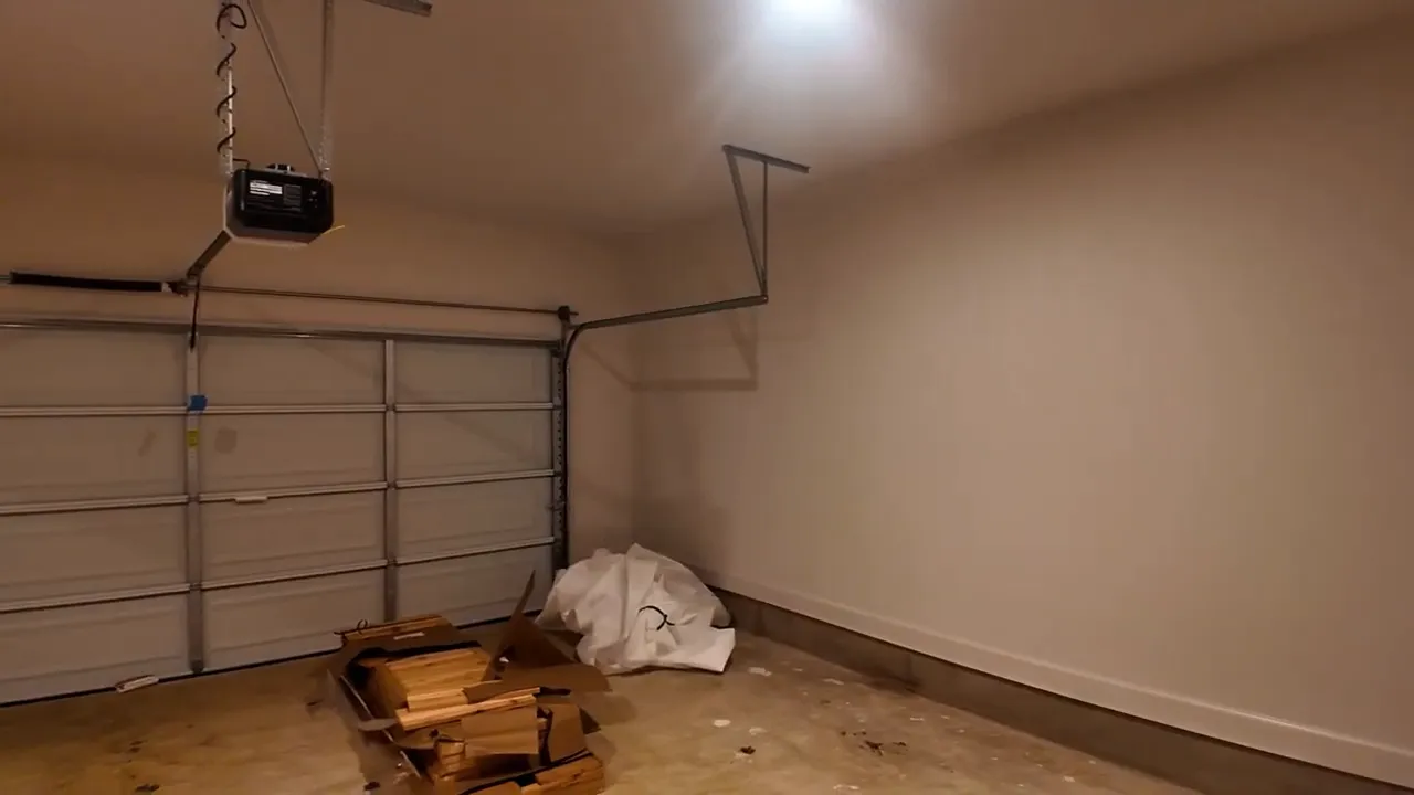 Extended garage interior with deep storage or workshop area