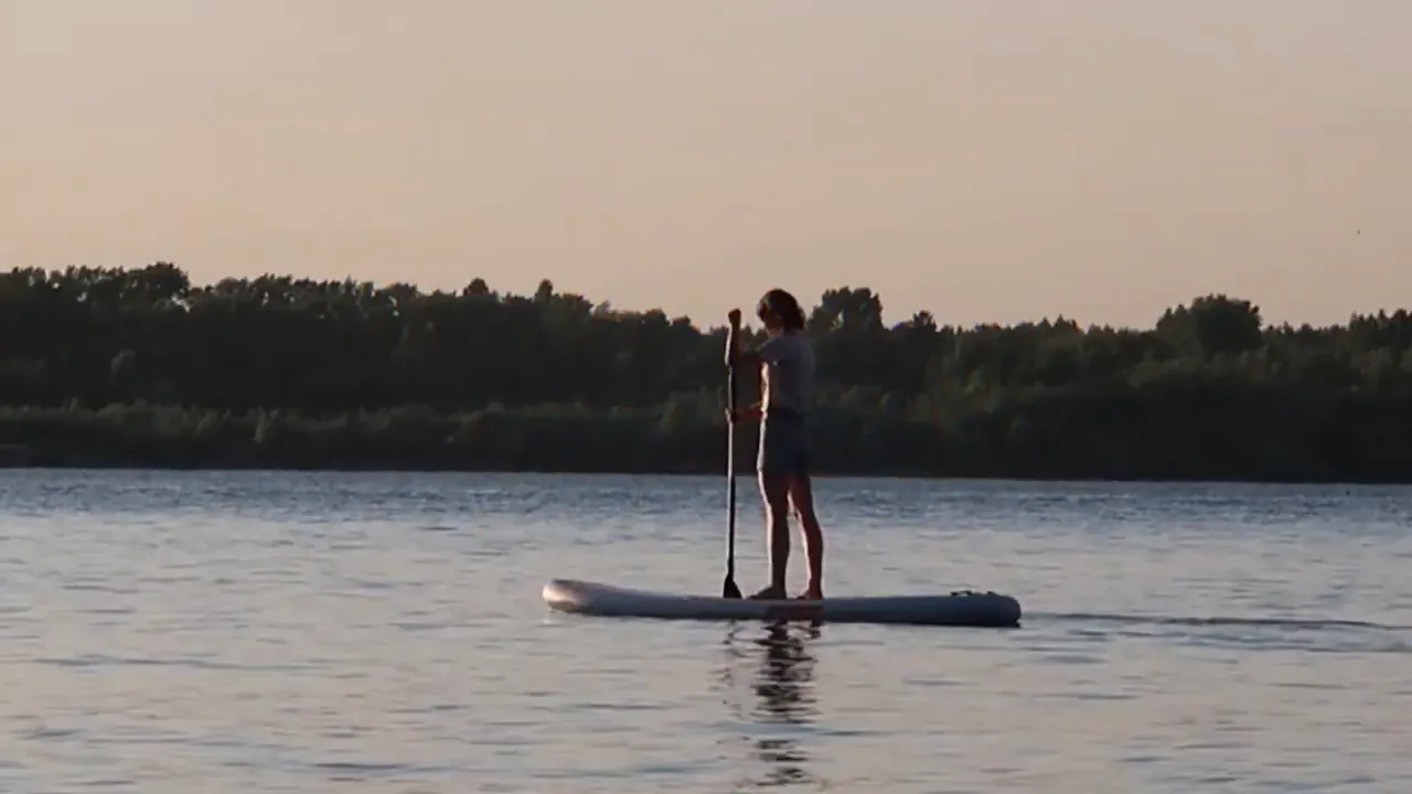 Person paddle boarding