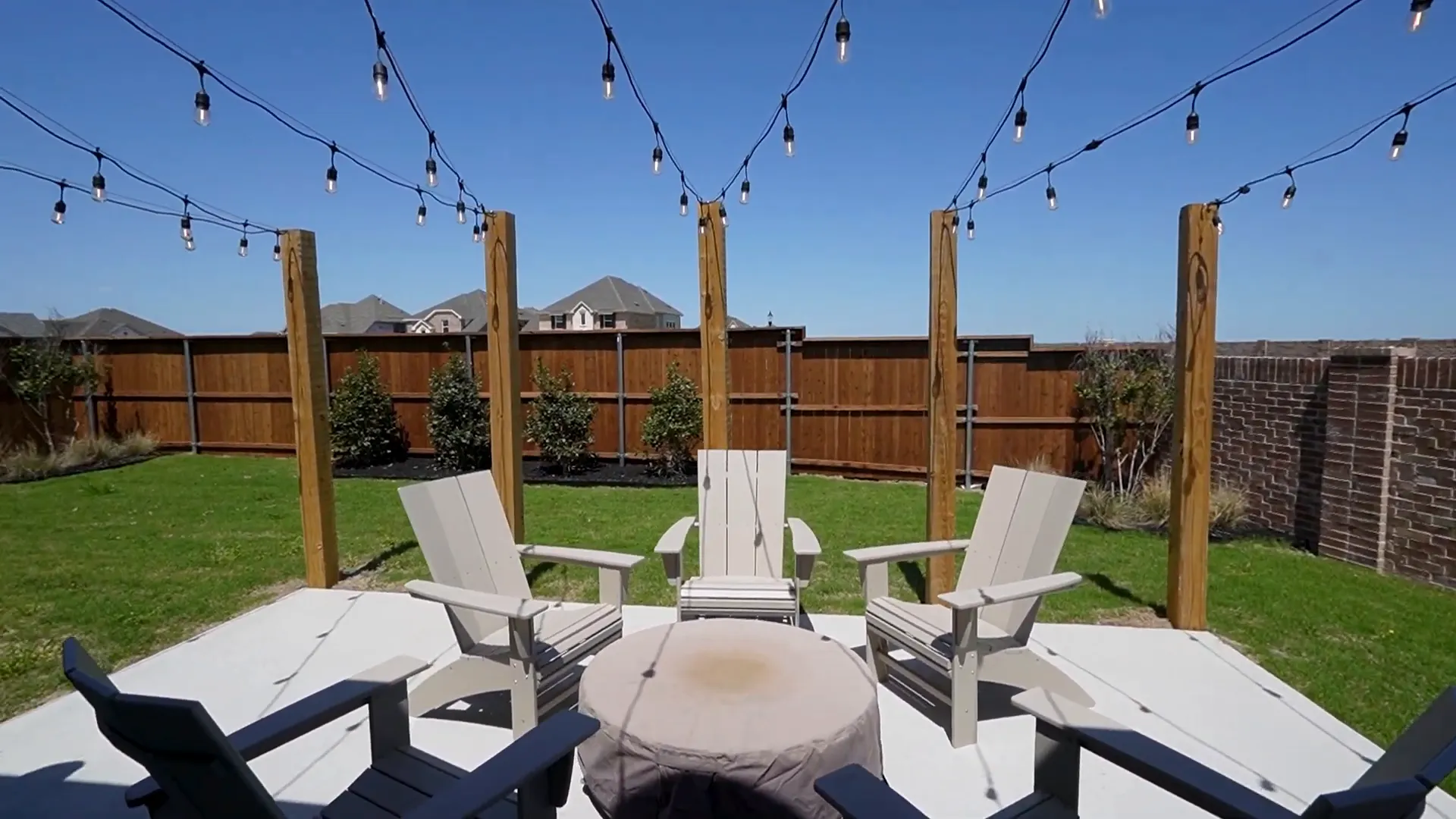 Covered patio and backyard in Creek View Meadows