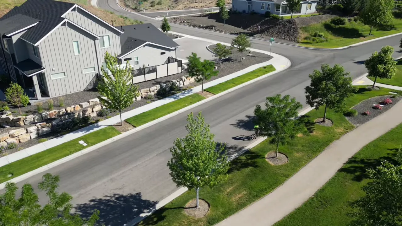 Overhead aerial view of curving roads and modern homes in an Eagle, Idaho foothills subdivision
